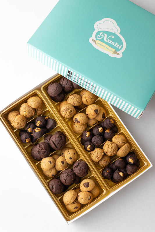Mixed cookies box - Gluten free (kilogram) Nutella cookies, walnut cookies, brown rice cookies &choc. Chips, brown rice & cocoa cookies علبة الكوكيز المشكل - (جلوتين فرى. كيلو جرام )  كوكيز نوتيلا ، كوكيز عين الجمل,كوكيز حبوب الشيكولاتة، كويز الكاكاو